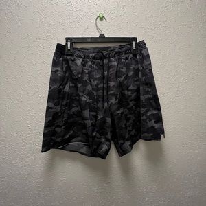 Black camo 6in lined surge shorts